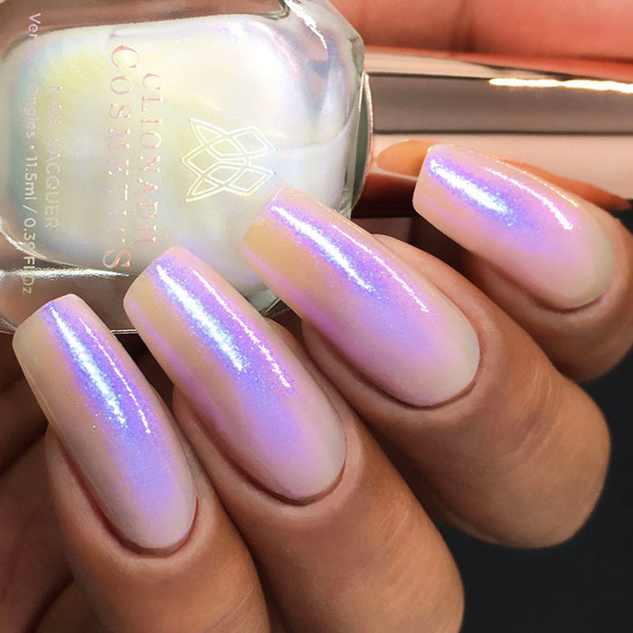 Close up shot of nails done with UV Nail Lacquer on medium skin tone