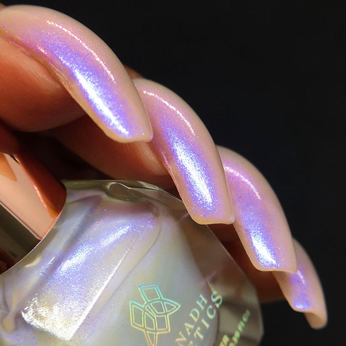 Right angled shot of nails done with UV Nail Lacquer on medium skin tone