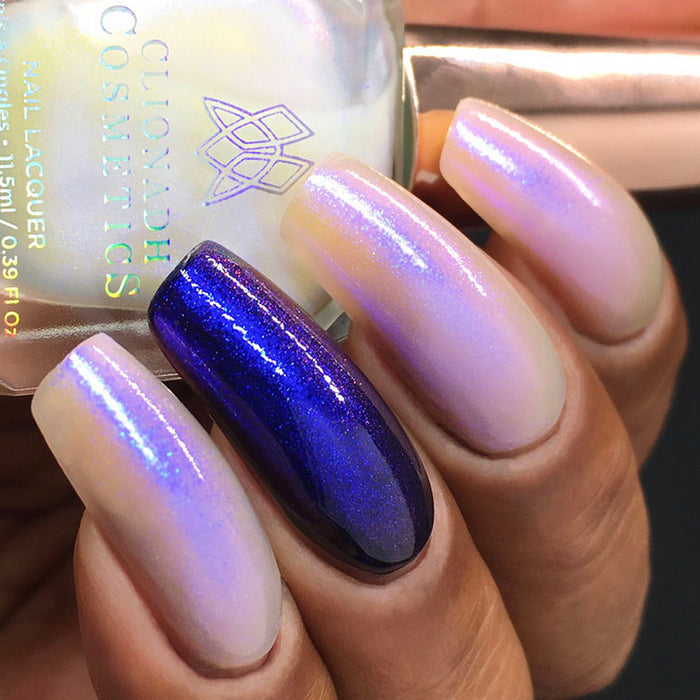 Bottom angled shot of nails done with UV Nail Lacquer on medium skin tone