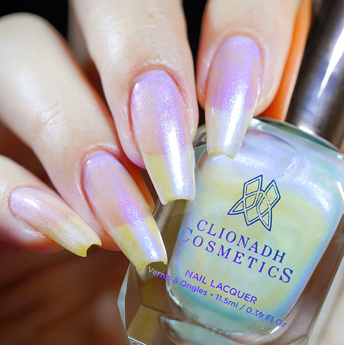Close up of nails done with UV Nail Lacquer on fair skin tone