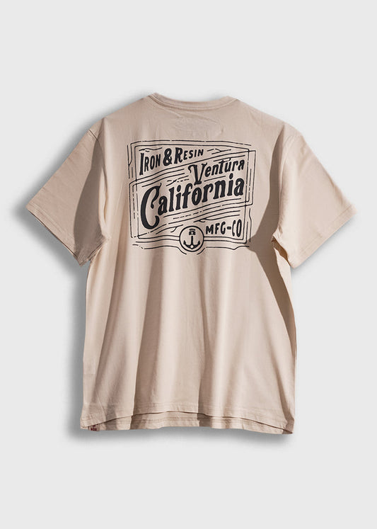 Beige T-shirt with bold black text: "Iron & Resin Ventura California MFG CO" on the back, styled in a vintage design.