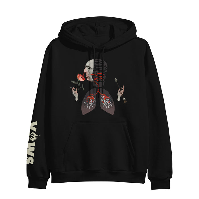Black pullover hoodie. The center of the hoodie has an image of two lungs connected to a head looking to the right. The right hand of the man holds a rose, and the left hand holds an arrow. The man is smelling the rose. The text "VOWS" is on the right sleeve near the cuff.