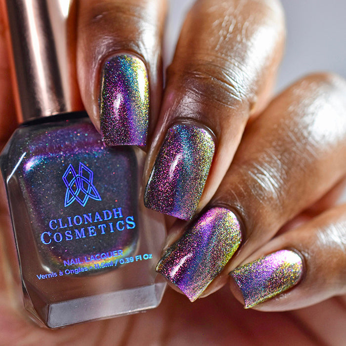Close up nails done with Warped nail lacquer featuring a design to show off the magnetic feature  on deep skin tone