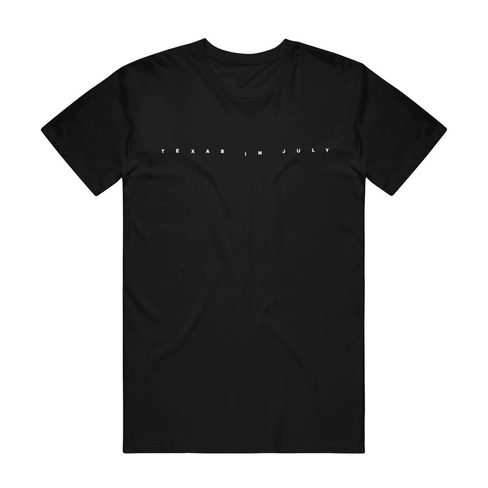 Black t-shirt with "TEXAS IN JULY" printed in small white font in the center.