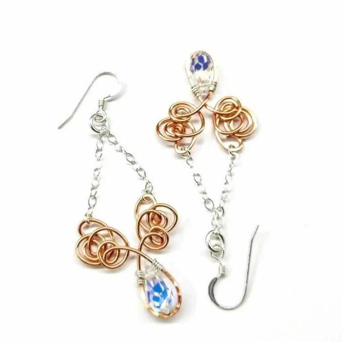 Wire Sculpted Crystal Drop Chandelier Angel Wing Earrings featuring unique wire-sculpted design and sparkling crystals.