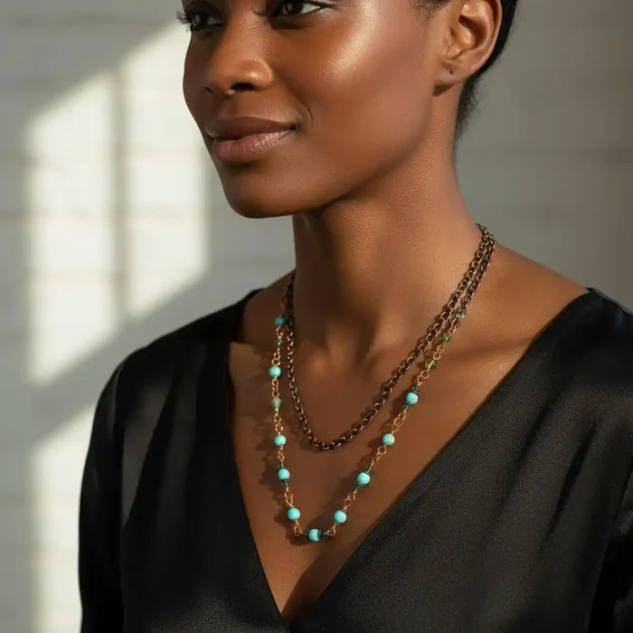 Wire Wrapped 24 Inches Copper Turquoise Necklace worn by a woman, featuring turquoise gemstones and sparkling crystals.
