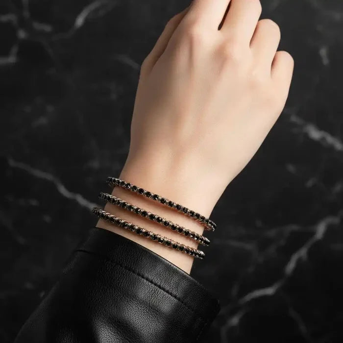 Wire Wrapped Copper Silver Black Crystal Rhinestone Bangle worn on hand, showcasing the elegant design and sparkling accents.