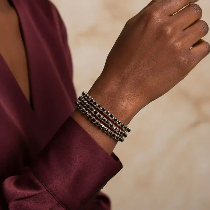Wire Wrapped Copper Silver Black Crystal Rhinestone Bangle worn on a hand showcasing its elegance.