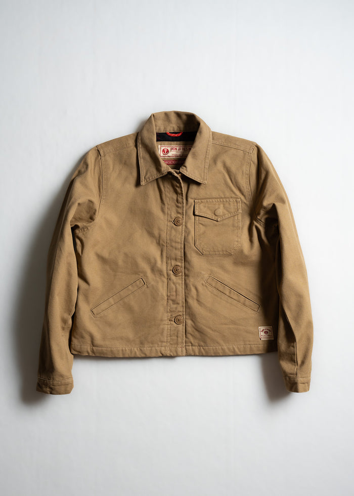 Brown canvas jacket with button front, chest pocket, and two side pockets, displayed on a white background.