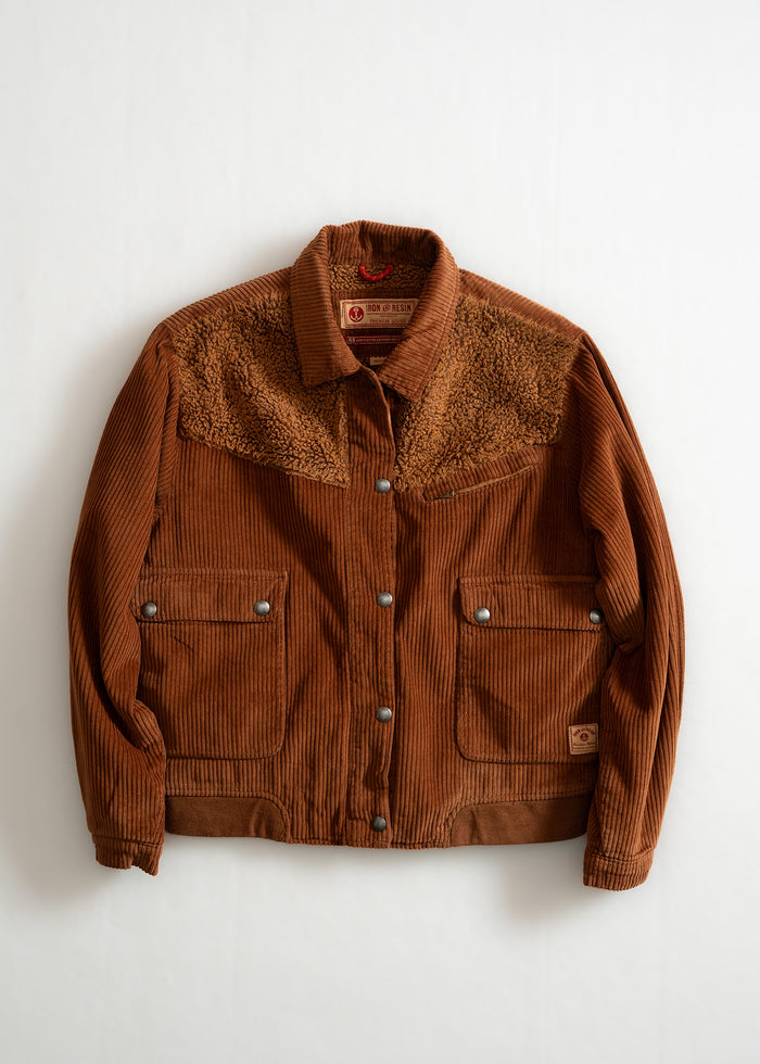 Brown corduroy jacket with shearling accents, buttoned front, and two pockets, hanging against a plain white background.