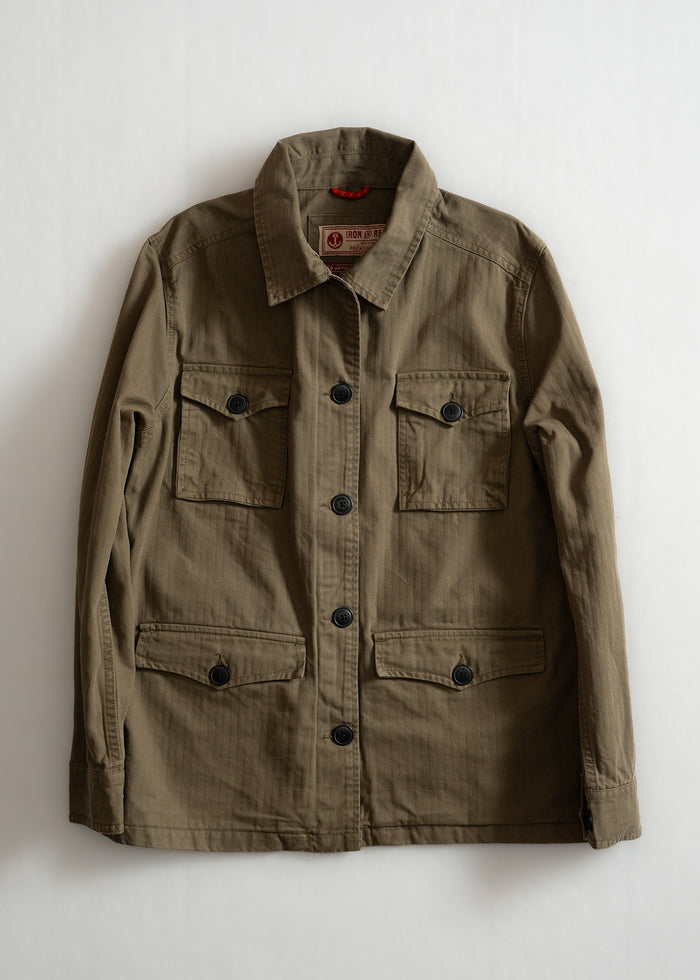 Khaki jacket with black buttons and four pockets, laid flat on a white background. Simple, classic design for versatile wear.