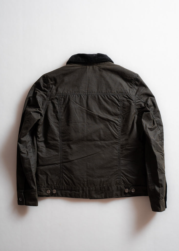 Dark jacket with a corduroy collar, viewed from the back, on a white background. Simple, classic design with button details.