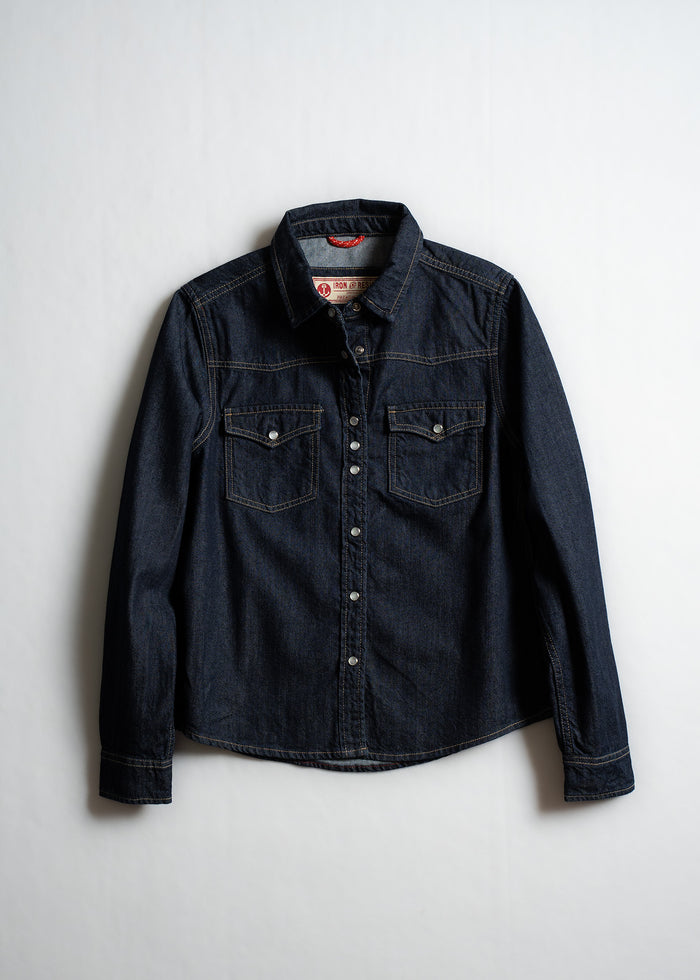 Dark denim shirt with button closure and two chest pockets, displayed against a plain white background.