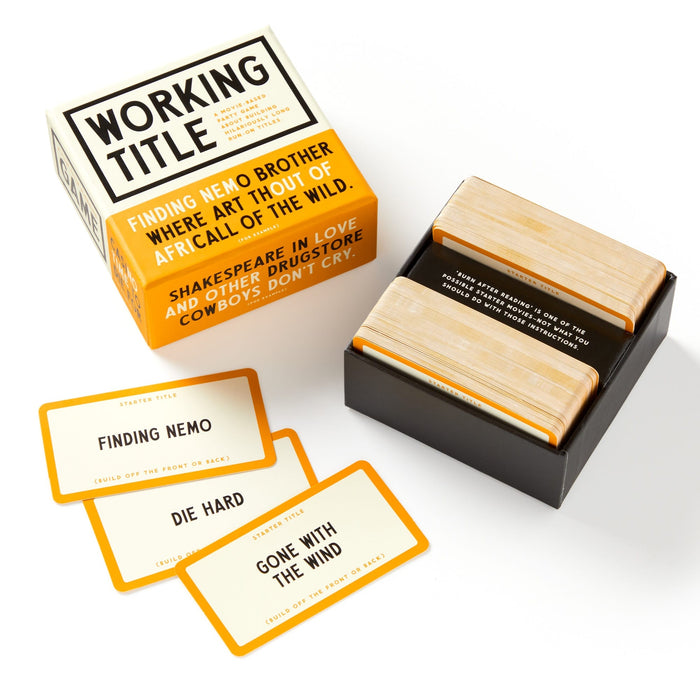 The Working Title Game by Brass Monkey is a popular film card game with an open box displaying two decks and three sample cards—FINDING NEMO, DIE HARD, and GONE WITH THE WIND—shown on a white background.