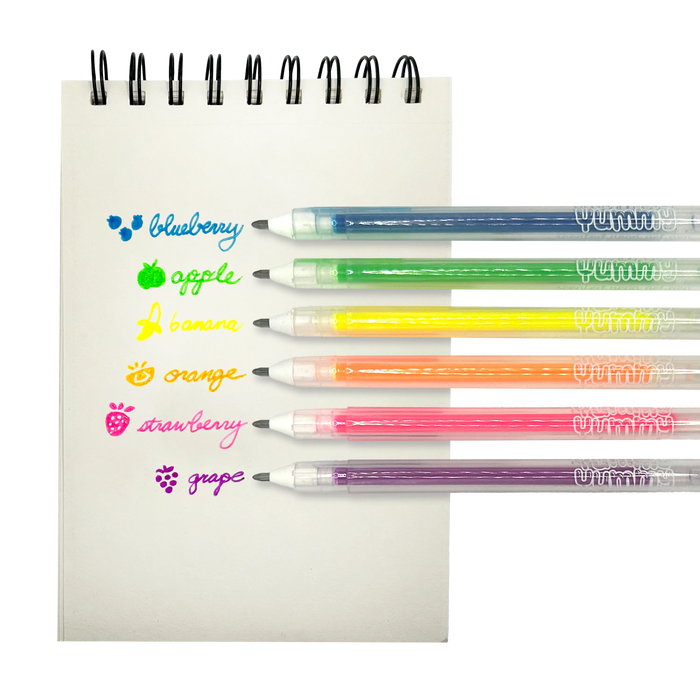 White paper pad with fruit scented watches with OOLY Yummy Yummy Neon Scented Gel Pens