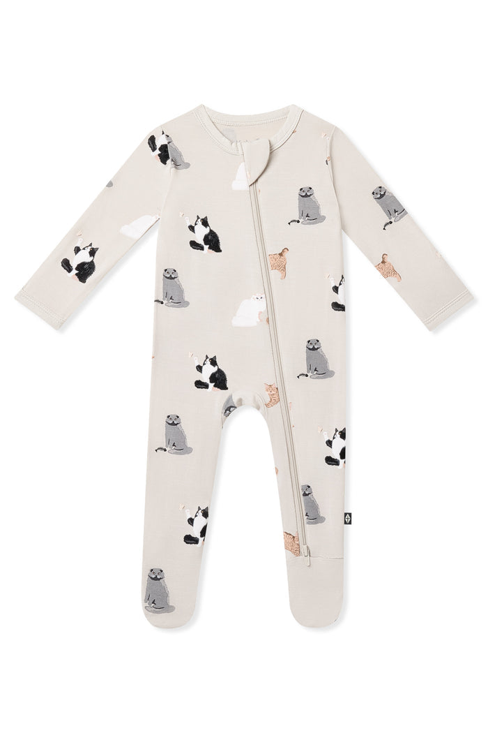 Zippered Footie in Fluffy Cat on a white surface