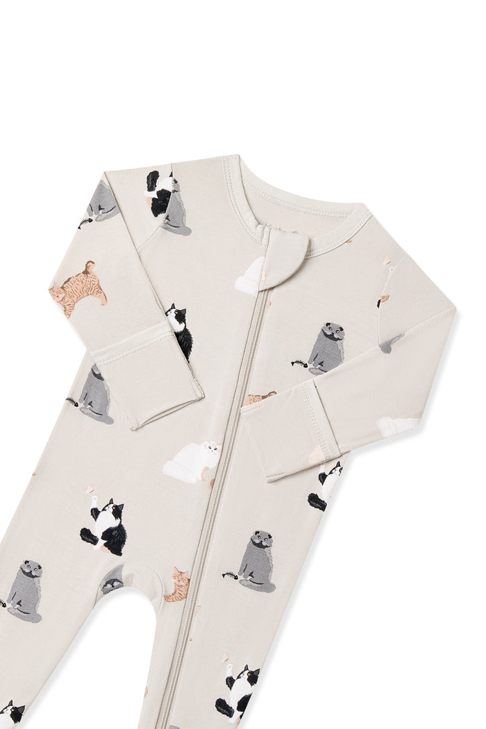 Close up of the zipper garage and fold over hand cuffs on the Zippered Footie in Fluffy Cat