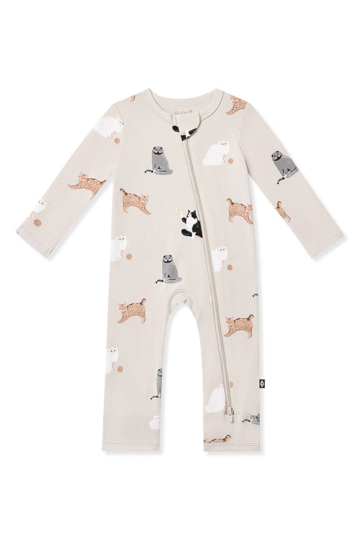 Zippered Romper in Fluffy Cat on a white surface
