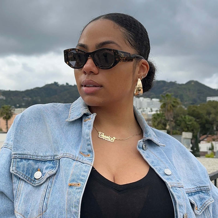 customer content - female wearing diff eyewear zoe round sunglasses with a espresso tortoise acetate frame and grey polarized lenses front view